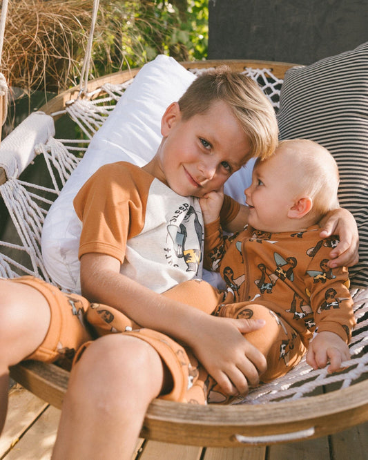 Printed Organic Cotton One-Piece Pajama Sloths On Tan Background-1