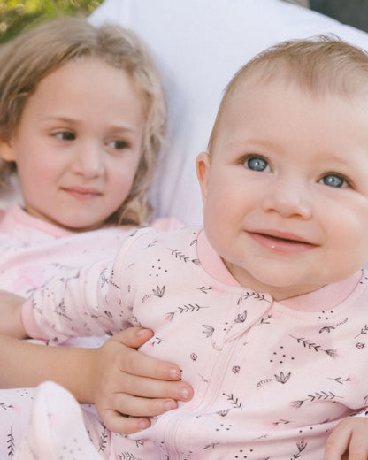 Printed Organic Cotton One-Piece Pajama Small Pink Flowers On Pale Pink Background-3