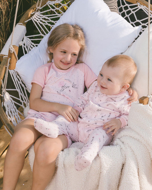 Organic Cotton Two-Piece Short Pajama Set Small Pink Flowers On Pale Pink Background-1